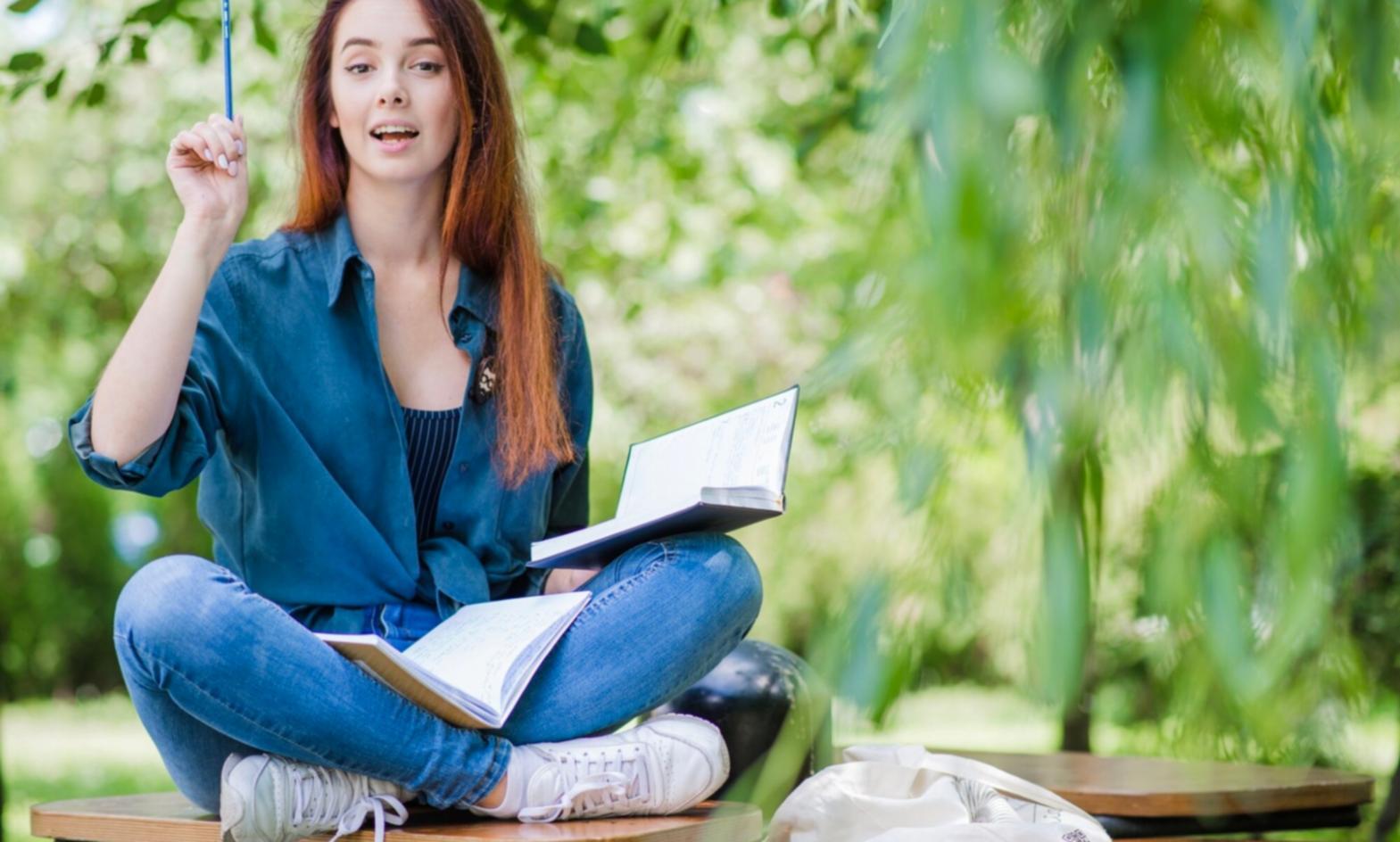 Professional home office setup with financial documents and laptop